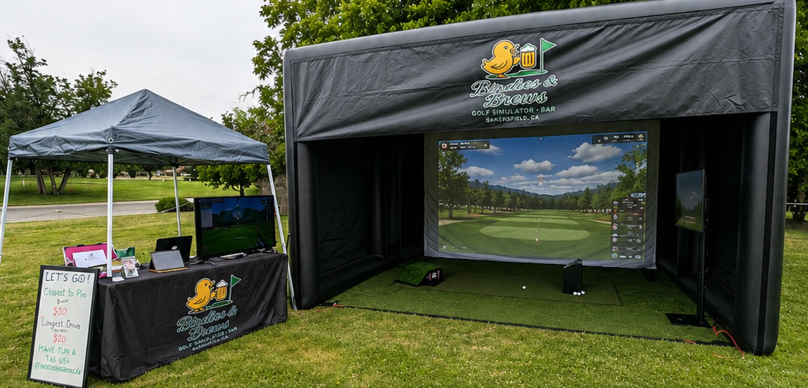 Birdies & Brews mobile golf simulator set up outdoors with the branded tent and screen.